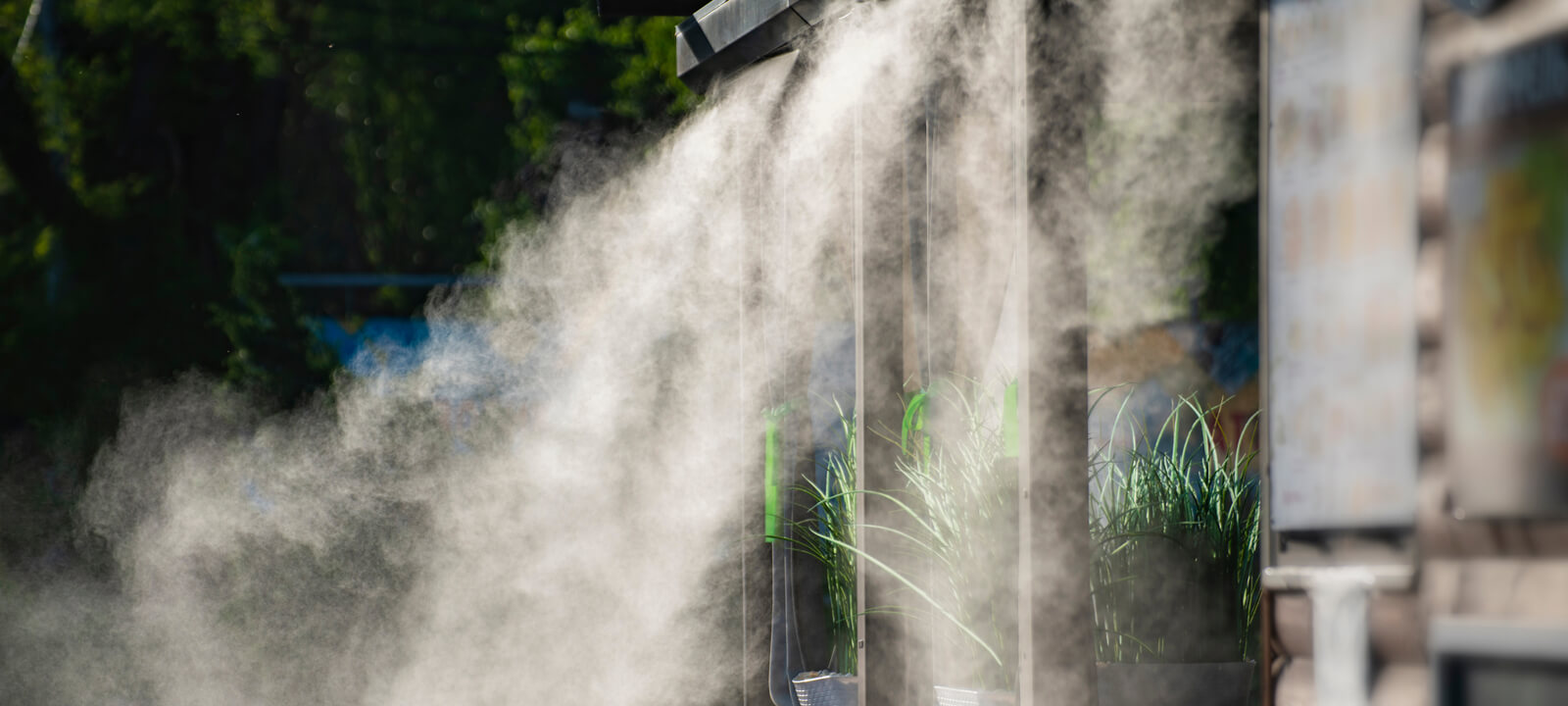 Water Spray System For Cooling In A Public Cafe At The Boiling Hot Summer Day